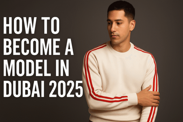 Confident male model posing in a Dubai studio wearing a white sweater with red stripes, beside bold white text that reads ‘How to Become a Model in Dubai 2025’. Professional thumbnail design for modeling guide in Dubai